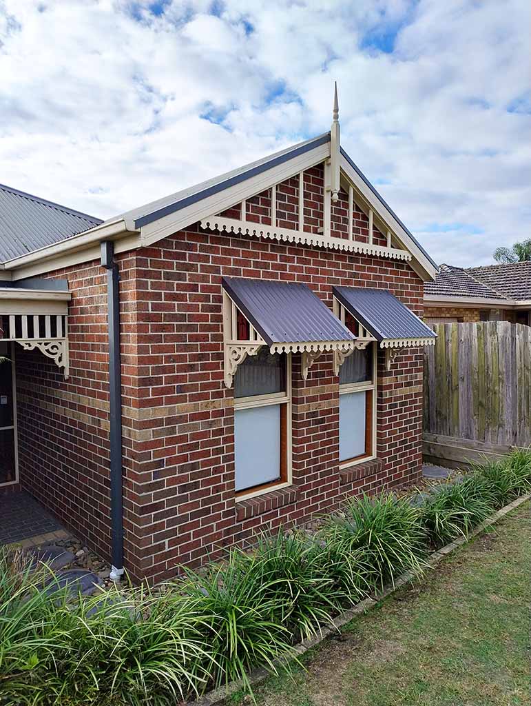 Decorative fretwork gable and awnings.